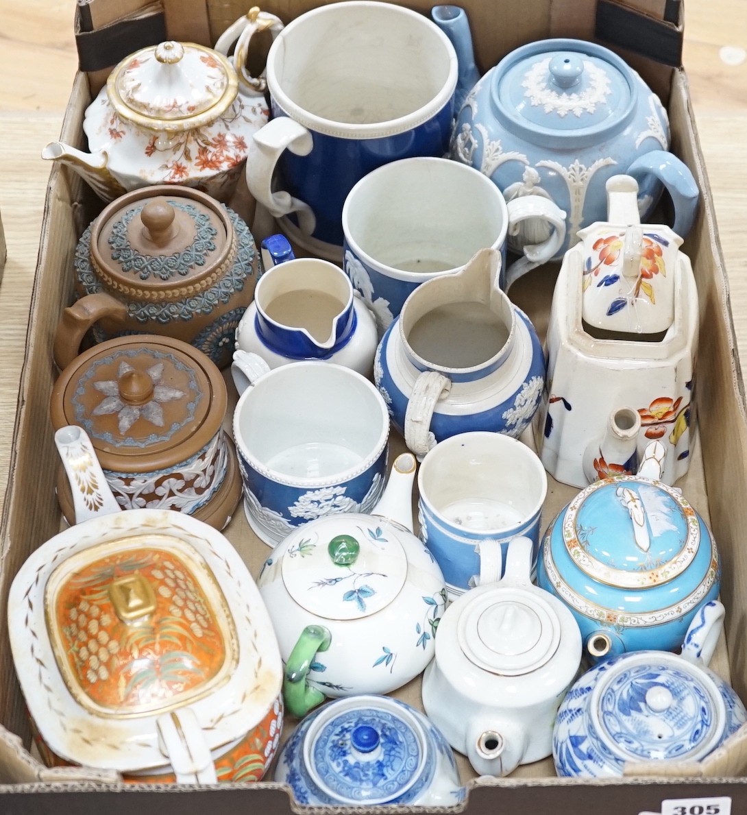 A large quantity of various teapots